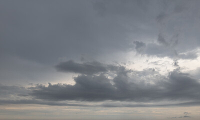 Obraz premium Sky replacement overhead ominous dark storm clouds at sunrise 2