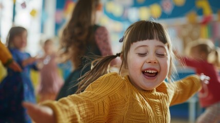 Obraz premium Cute little girl dancing happily at nursery school