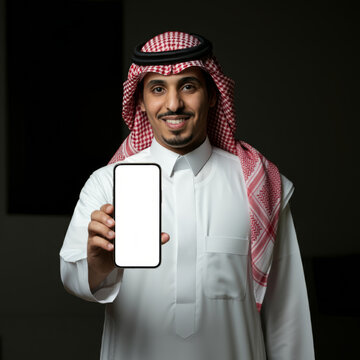 saudi man holding smart phone with his hand showing the screen to camera, Mockup a isolated for Infographic Business web site design app
