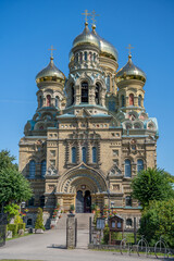 Naklejka premium The St. Nicholas Naval Cathedral in Karosta, Liepaja at summer. Russian Orthodox cathedral with golden domes.