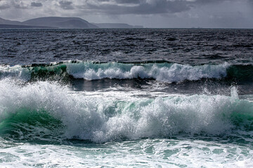 The wild Atlantic Ocean, waves coming in with the tide at Downpatrick Head, County Mayo, Ireland