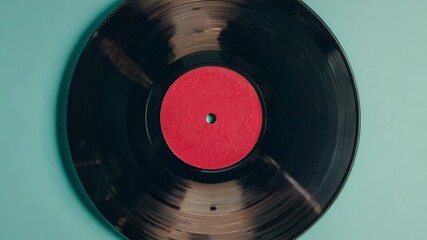 A classic vinyl record album displayed against a wall.