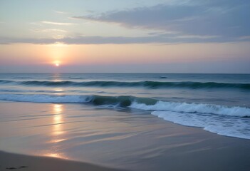 Obraz premium A serene ocean landscape with calm, rippling waves reflecting the warm, pastel-colored sky and bright sun in the distance