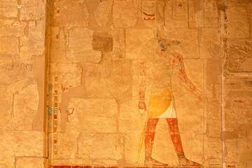 Marvel at the beautiful wall art found within Hatshepsut's mortuary temple. The intricate hieroglyphs and colorful murals create a sacred and spiritual atmosphere.