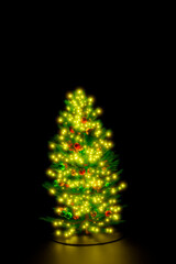 Obraz premium Ornamental 3d rendered Christmas tree glowing at night