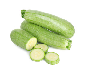 Fresh whole and cut zucchinis isolated on white