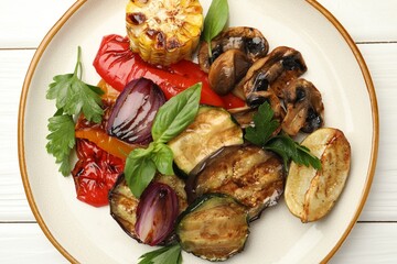 Delicious grilled vegetables with spices on white wooden table, top view