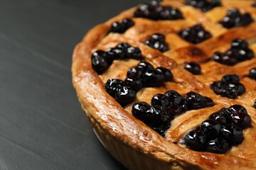 Tasty homemade pie with blueberries on grey table, closeup