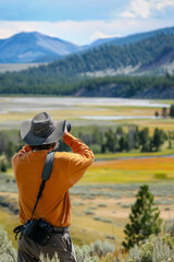 Nature photographer at golden hour