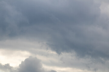 Sky replacement high dark gray and light gray storm clouds seen above
