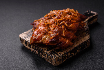 Delicious juicy grilled ribs with honey and mustard sauce with salt, spices and herbs