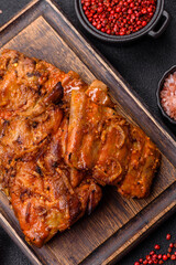 Delicious juicy grilled ribs with honey and mustard sauce with salt, spices and herbs