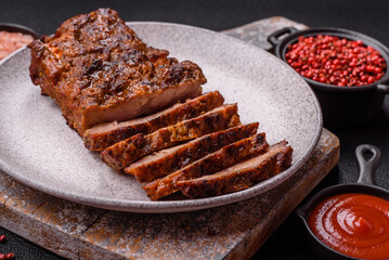 Fresh juicy delicious beef steak on a dark background