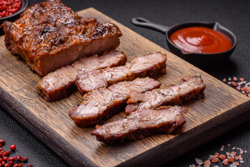 Fresh juicy delicious beef steak on a dark background