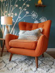 An orange armchair with cushions in a stylish, cozy living room.