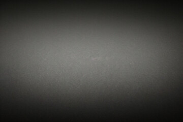 Black foil gradient texture background with uneven surface