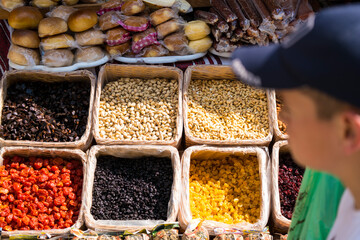 a real Ukrainian fair where various nuts, dried fruits and other things are sold in baskets
