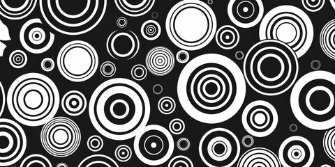 A dynamic and intricate pattern composed of white and black circles in a variety of sizes for a modern look