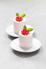 Red Currant Cream pudding cylindrical shape. Close up
