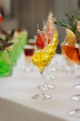 Welcome drink with cocktail glasses and drinks at an event. Alcoholic beverages at a wedding