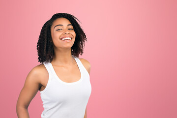 Positive Emotions. Happy black girl laughing and looking at camera isolated on white studio background, copyspace