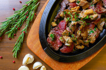 Beef with mushroom on cast iron