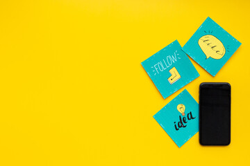 Digital marketing concept with mobile phone and social media icons