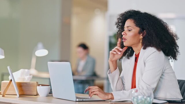 Real estate agent typing a creative property marketing advertisement to post on social media to sell a new house. Confident, ambitious realtor with afro negotiating deal via email using her laptop