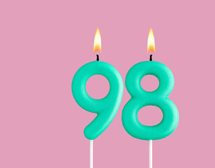 Birthday card with green number 98 candle - Pastel pink background