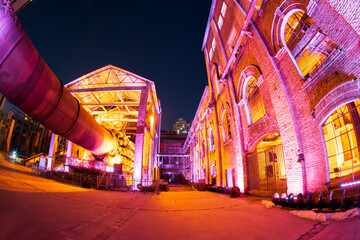 Factory buildings and industrial equipment in the evening