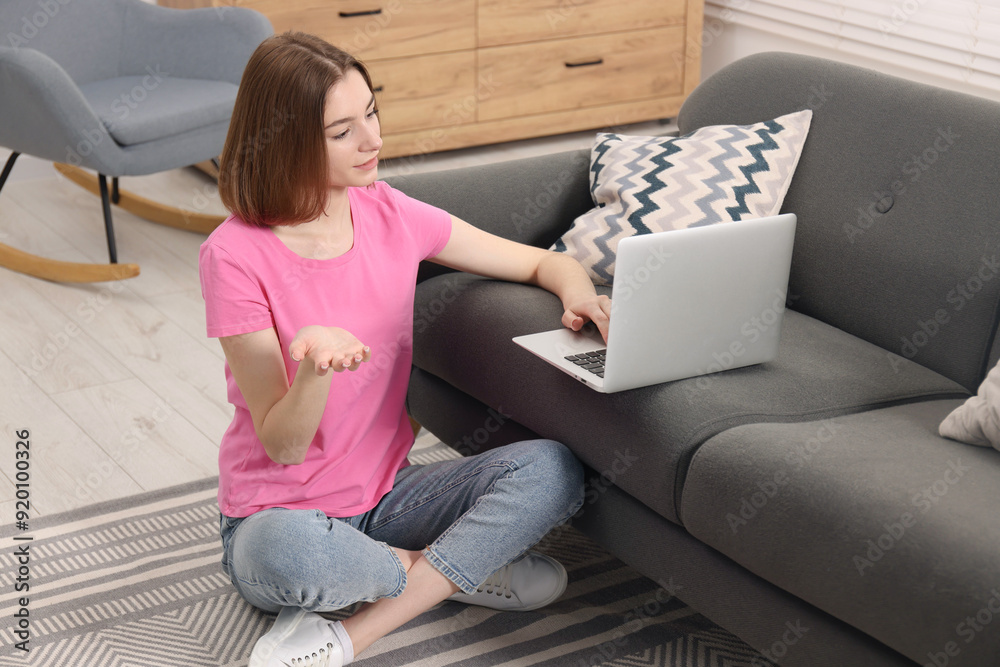 Sticker Teenager having video chat via laptop at home. Remote work