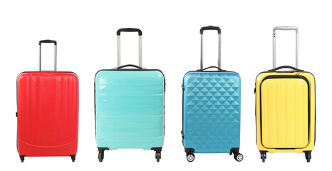 Stylish suitcases of different colors on white background, set