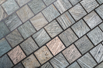 Detailed Background of Stone Tiles and Black Mortar.