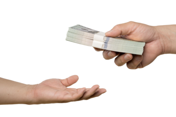 Hands giving money. A financial transaction between two parties