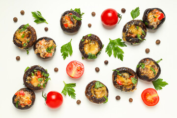 Stuffed mushrooms, tomatoes and spices on white background, top view