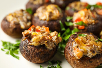 Stuffed mushrooms with cheese on light background, close up