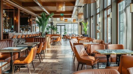 Fototapeta premium Modern Restaurant Interior with Warm Lighting and Brown Leather Chairs