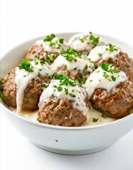 Fototapeta premium bowl filled with meatballs covered in gr grade sauce