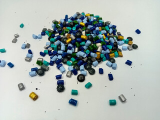 masterbatch granules, colorful polymer masterbatch granule plastic, cold cutting type, isolated on white background, for catalog banner design, product photo, company profile, industrial plastics