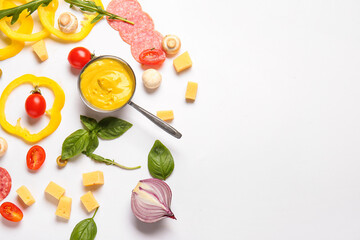 Ingredients for preparing pizza on white background