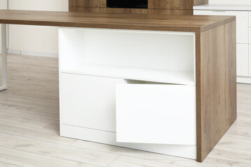 White counter with drawers in light kitchen