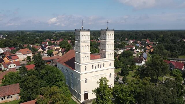 Drone shot of the village church Schinkelkirche in Straupitz, Germany.