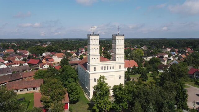 Drone shot of the village church Schinkelkirche in Straupitz, Germany.