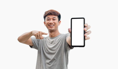 A young Asian man in his 20s wearing a gray t-shirt happy face and gives thumbs up on mobile phone with blank white smartphone screen isolated on white background