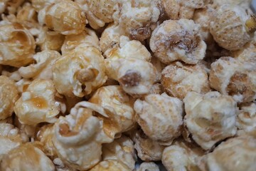 Popcorn texture crunchy view cooked with sweet caramel and cheese salted flavors | Food natural photos