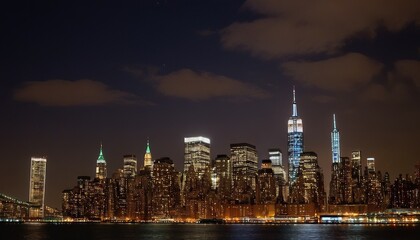 Obraz premium A night view of the Manhattan skyline from across the Hudson River 10