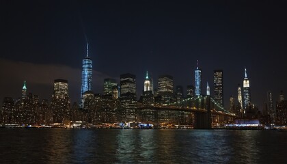 Obraz premium A night view of the Manhattan skyline from across the Hudson River 7