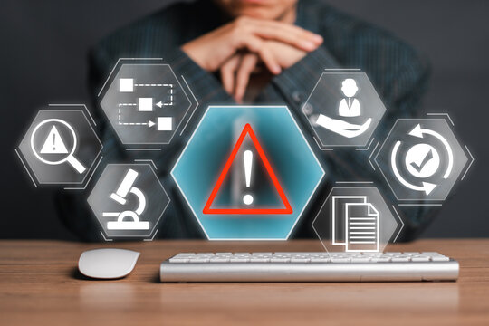 Visual representation of incident management with warning symbol and business icons on a digital interface, emphasizing risk and response.