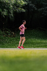 Runner warming up on the track before starting the outdoor training session