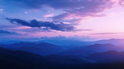 The calming view of an evening sky, blending shades of purple, blue, and white in a perfect twilight scene.